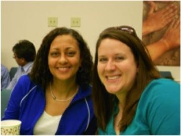 Andrea and Sarah are all smiles during the social portion of the Naw Ruz celebration. 